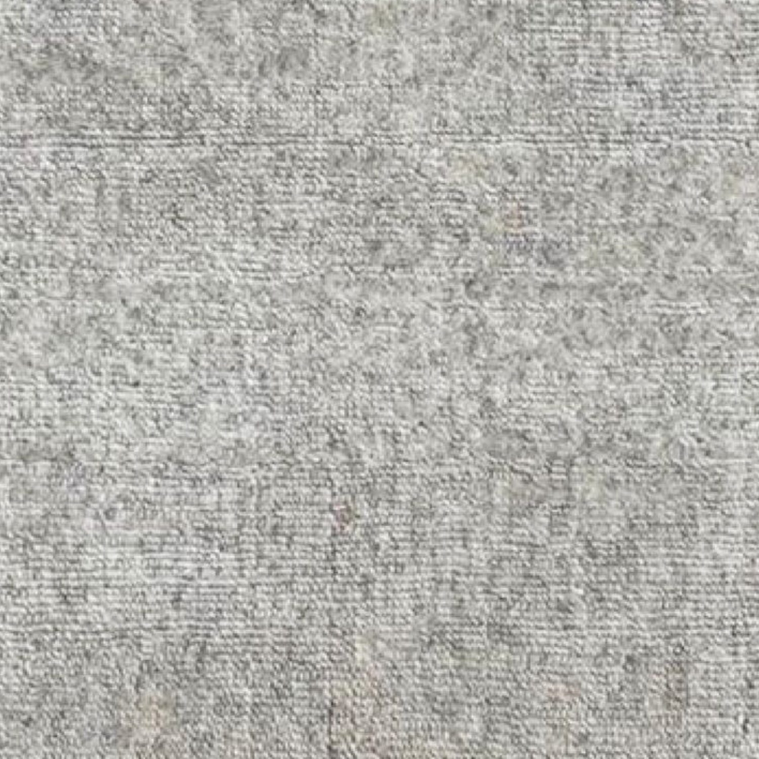 Solid carpet with a richly textured surface