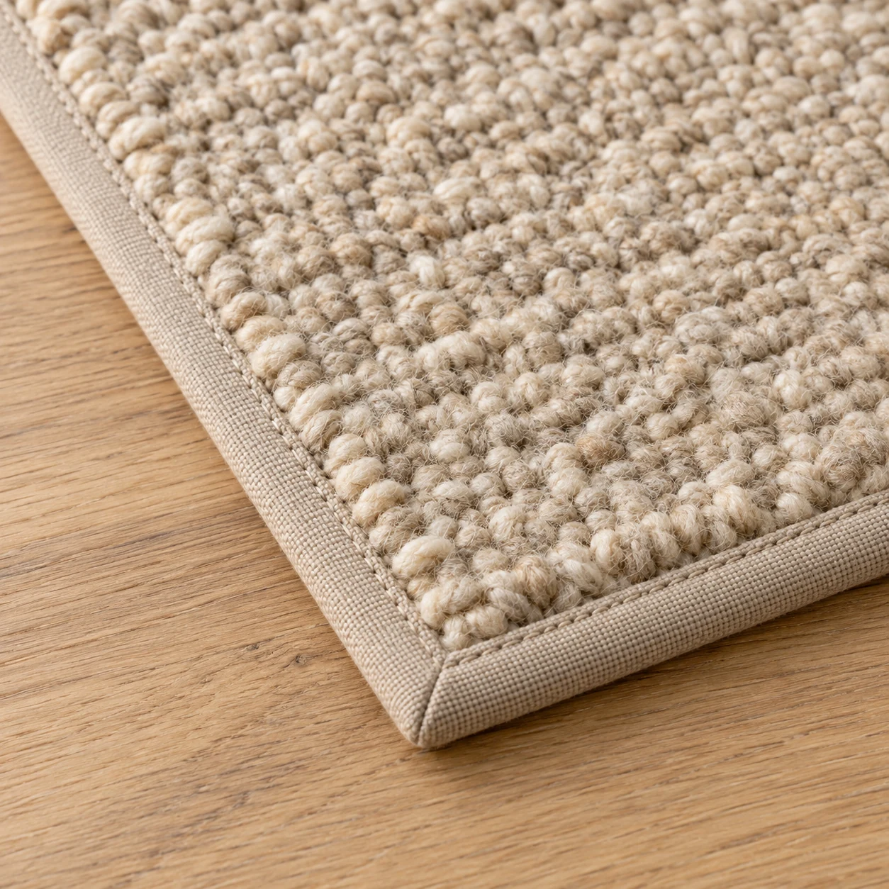 Close-up of narrow binding on a carpet edge